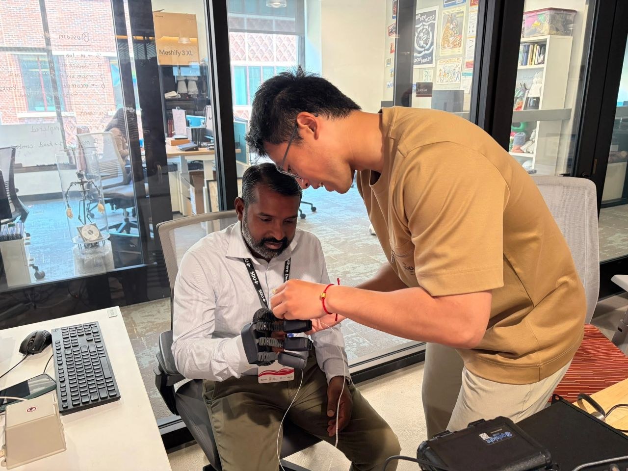 Fitting the Weart haptic glove on a user's hand
